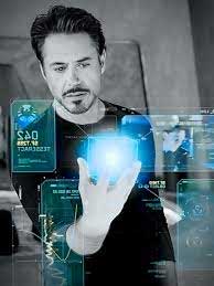 Tony Stark working with Jaris in the film <i>Iron Man</i>.